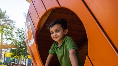 A child plays at Latifa's Adventures playground.