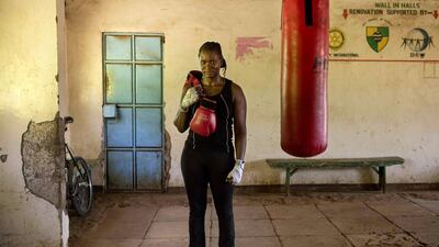 Sarah Achieng, a professional boxer and sports administrator, poses after her training session at Kariobangi social hall gym in Nairobi. AFP