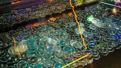 A coin pusher arcade game at Central.