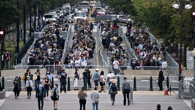Thousands of mourners queued to pay their respects to Justice Ginsburg, a champion of women's and civil rights, at the US Supreme Court building before her casket was taken to lie in state at the US Capitol on September 25, 2020. Bloomberg