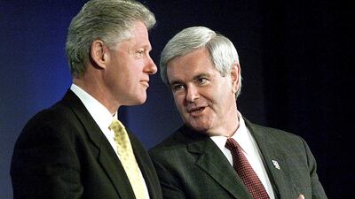 This June 4, 1998 photo shows Newt Gingrich, speaker of the US House of Representatives, conferring with US president Bill Clinton in Washington. AFP