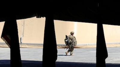 A US soldier is seen during a handover ceremony of Taji military base from US-led coalition troops to Iraqi security forces, in the base north of Baghdad, Iraq August 23, 2020. Reuters