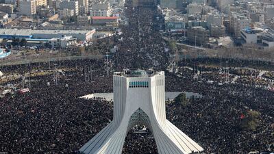 Iranian mourners taking part in a funeral procession in Tehran for Qassem Suleimani. AFP