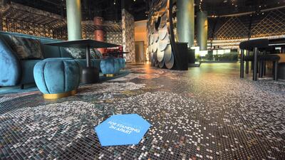 A social distancing sign inside the W Hotel on Yas Island. Courtesy DCT-Abu Dhabi